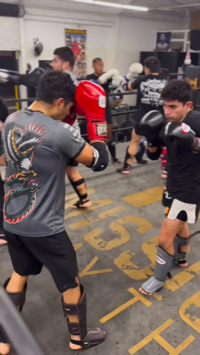M1 level class in full effect ✊🏽

Our M1 students are sharpening close-range sequences and learning how to apply strategy and tactics with purpose. Mission Level One classes go beyond basics - more technical drilling and sparring, more controlled impact, and higher-level conditioning are expected. 

This is where fundamentals evolve into building more Muay Thai fight IQ. Train with intention. Level up your Mission!